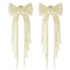 "Shiny bow" earrings gold